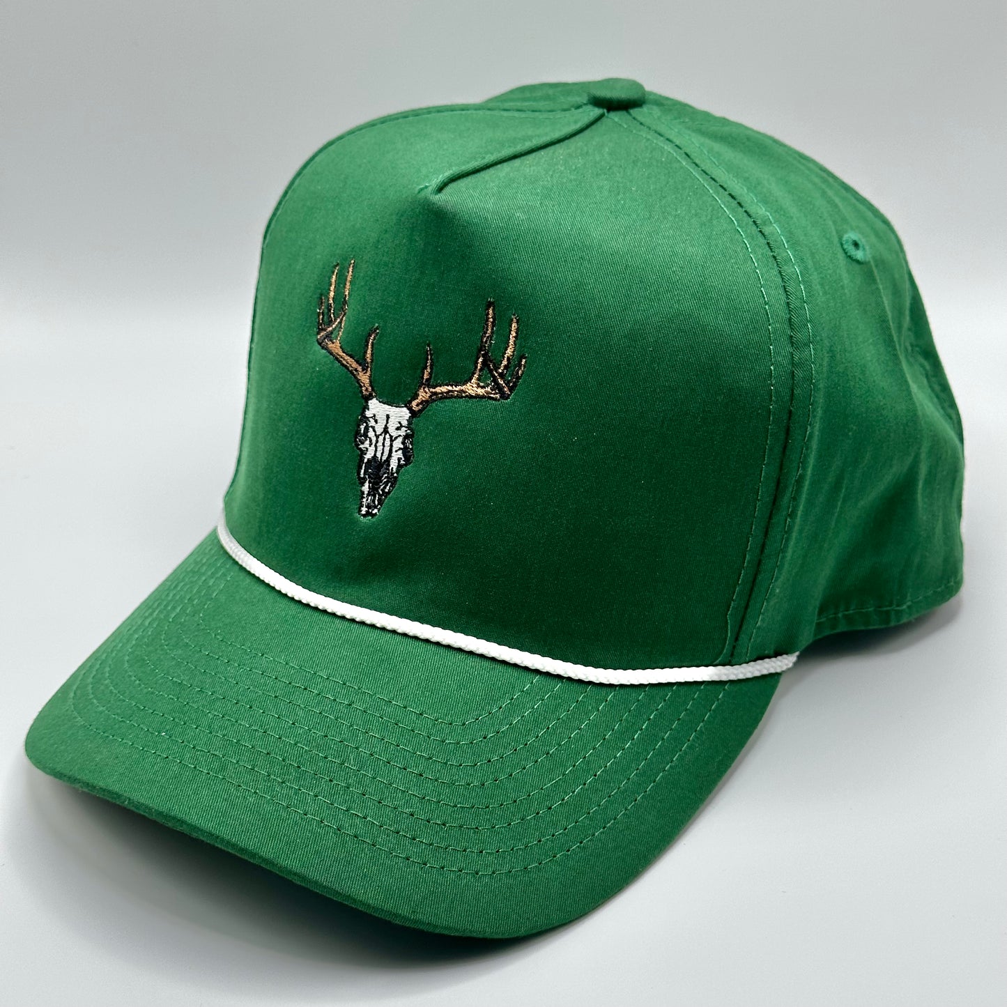 Forest green buck skull snapback