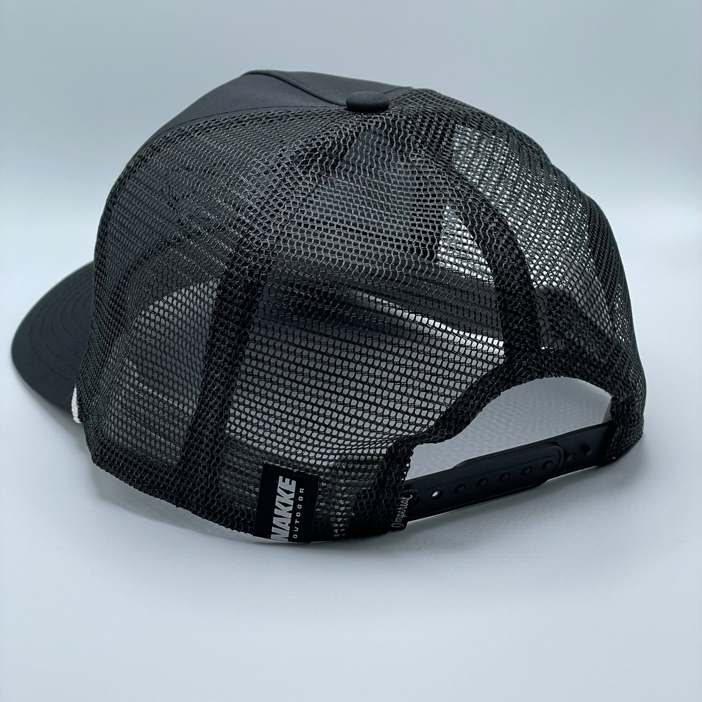 Black 5 panel retro fit mesh back hat with a white embroidered fish on the front