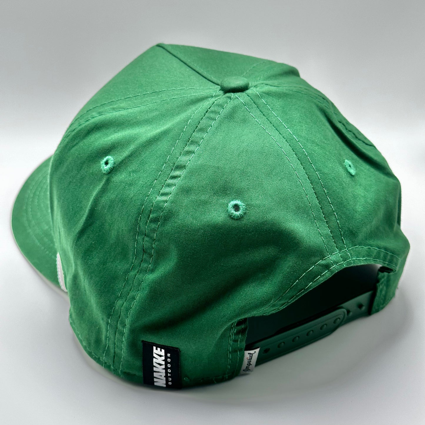 Forest green buck skull snapback