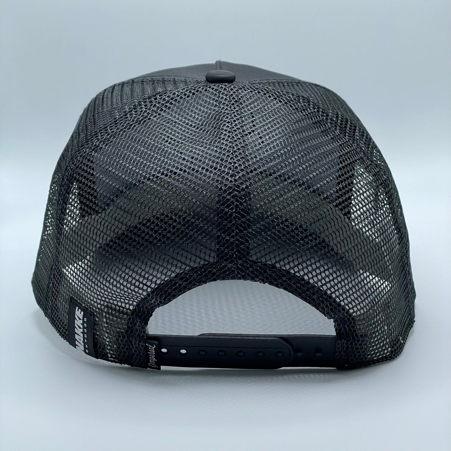 Black 5 panel retro fit mesh back hat with a white embroidered duck on the front