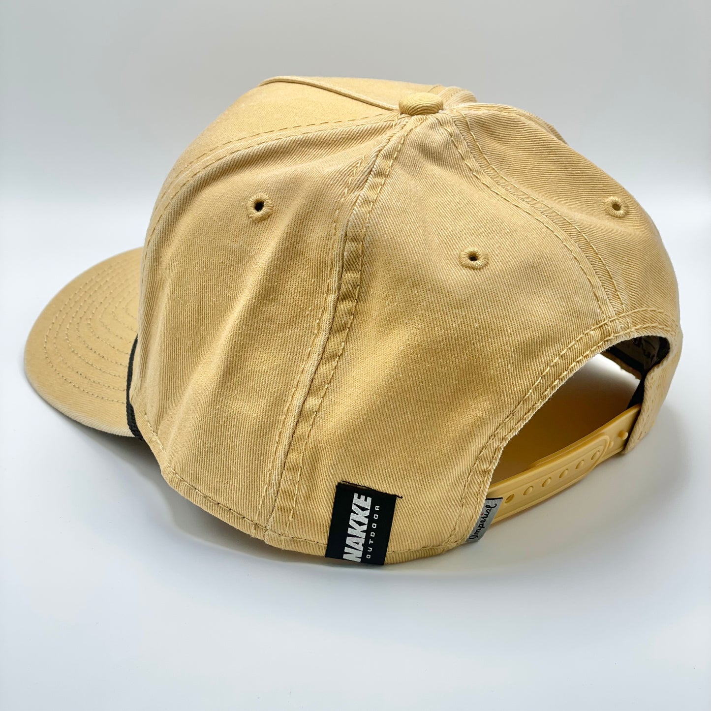 Pigment Washed Cotton Twill 5 Panel “Honey” Colored Hat with Embroidered Bass on the front and a black rope running along the base